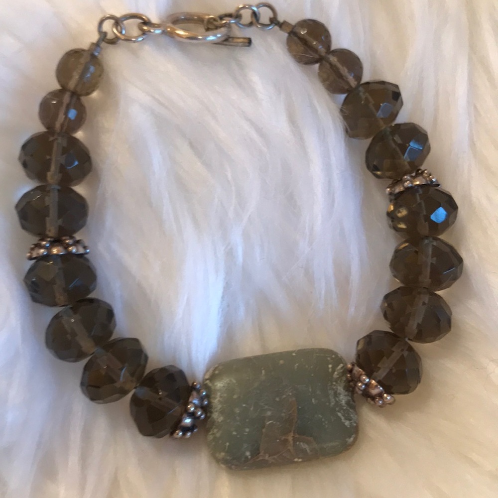 Bracelet. Center Stone w/ jewels & silver details